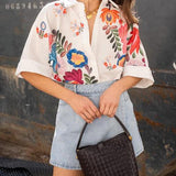 Carla - Camisa de manga curta com estampa floral