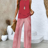 Alba | Conjunto de blusa e calça com estampa floral estilosa