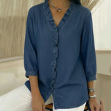 Adele | Blusa em denim fluido com decote em V e volante