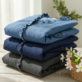 Adele | Blusa em denim fluido com decote em V e volante