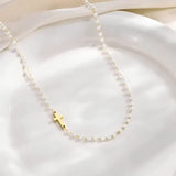 Conjunto com Cruz e Pérolas
