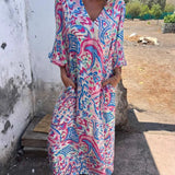 Camille | Vestido longo luxuoso com decote em V e bolsos