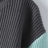 Elegante camisola de gola alta com patchwork