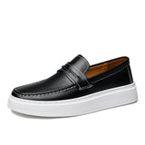 Sapatos de barco em pele