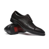 Sapatos de negócios chiques em pele