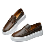 Sapatos de barco em pele