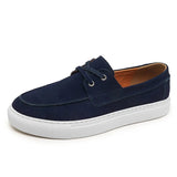Sapatos elegantes de camurça