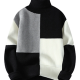 Elegante camisola de gola alta com patchwork
